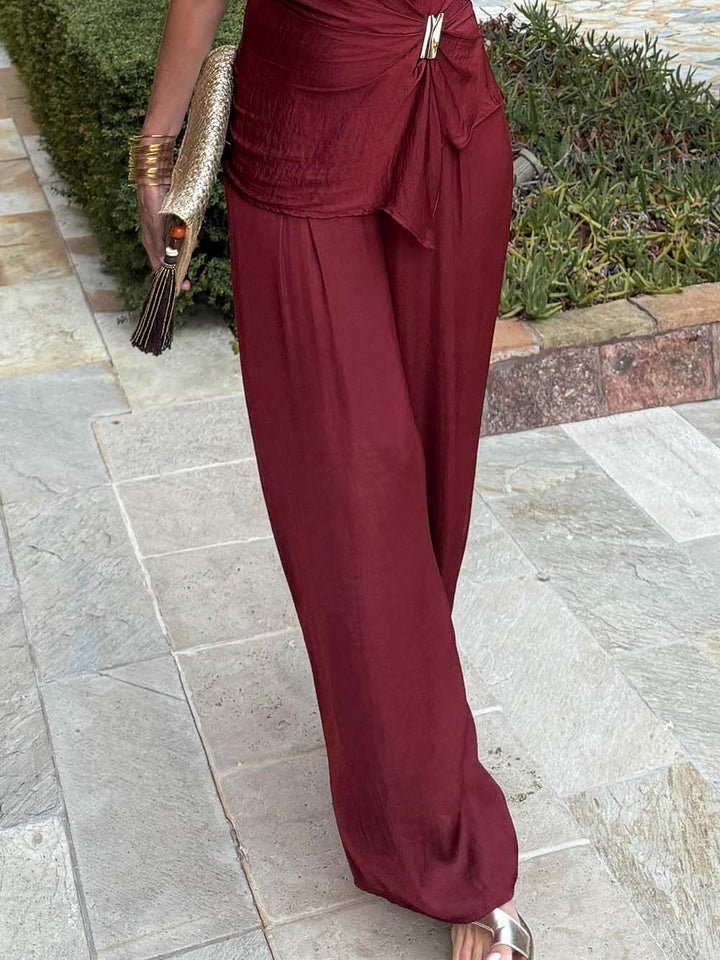 Unique Asymmetric Hem Metallic Accents Top